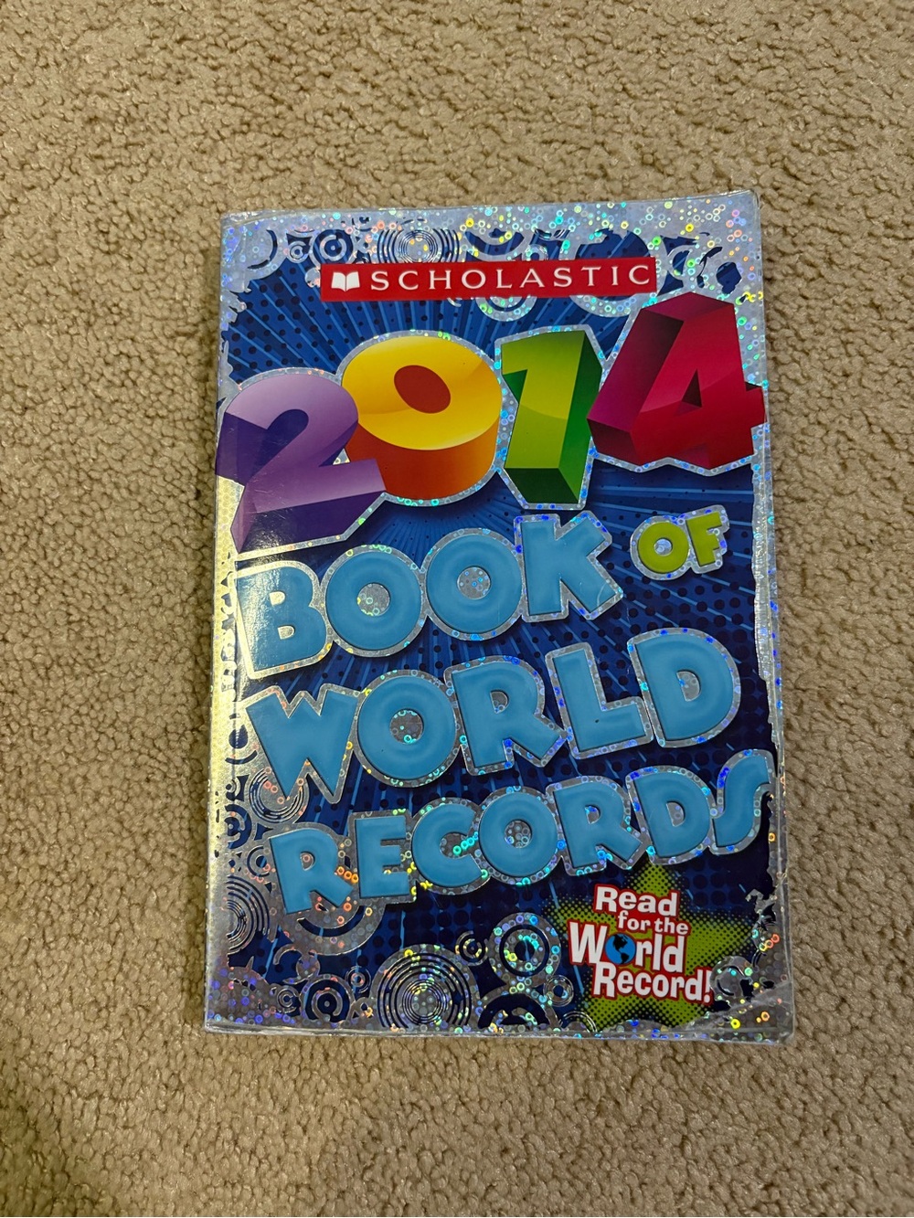 Scholastic Holographic Blue 2014 Book of World Records